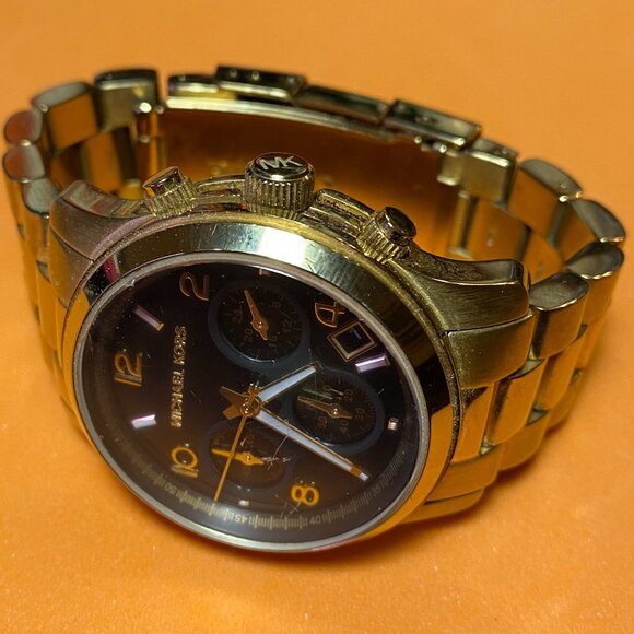Michael Kors Ladies Black/Yellow Gold Toned Watch